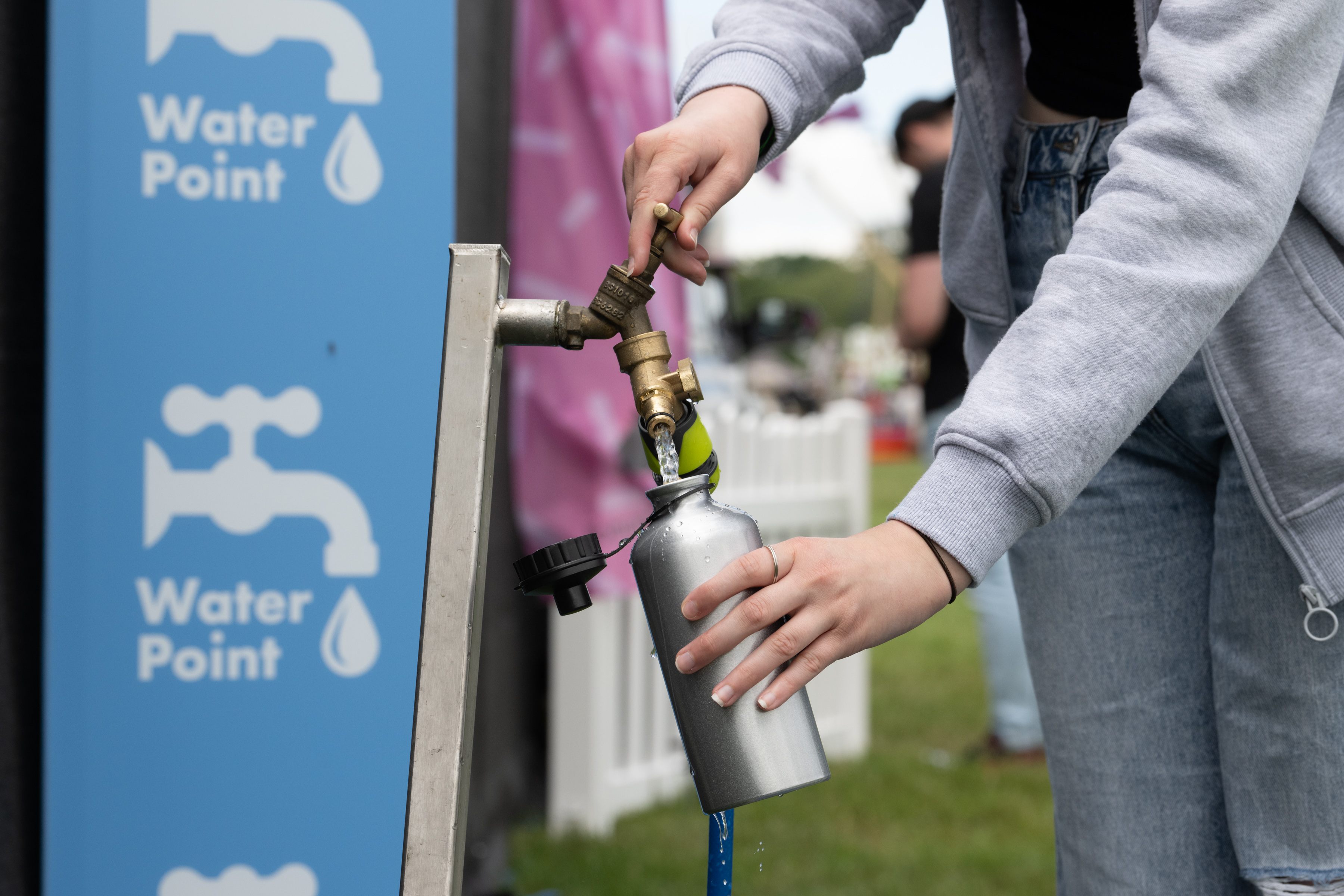 re-filling a water bottle